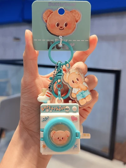 Butterbear Keychain - Green Edition, Playful Washing Machine Design, Cute Bear Figure, Interactive Projection Feature, Fun to Use, Perfect for for everybody, Unique Collectible Item, Great Gift for Birthdays & Special Occasions, Adds a Playful and to Keys or Bag Gift for Birthdays & Special Occasions, Adds a Playful and to Keys or Bags, Novel Girls Cuteables, as Accessories for Teens, Perfect for Everyday Use, Fun Gift Idea, Stylish Collectible Charm.