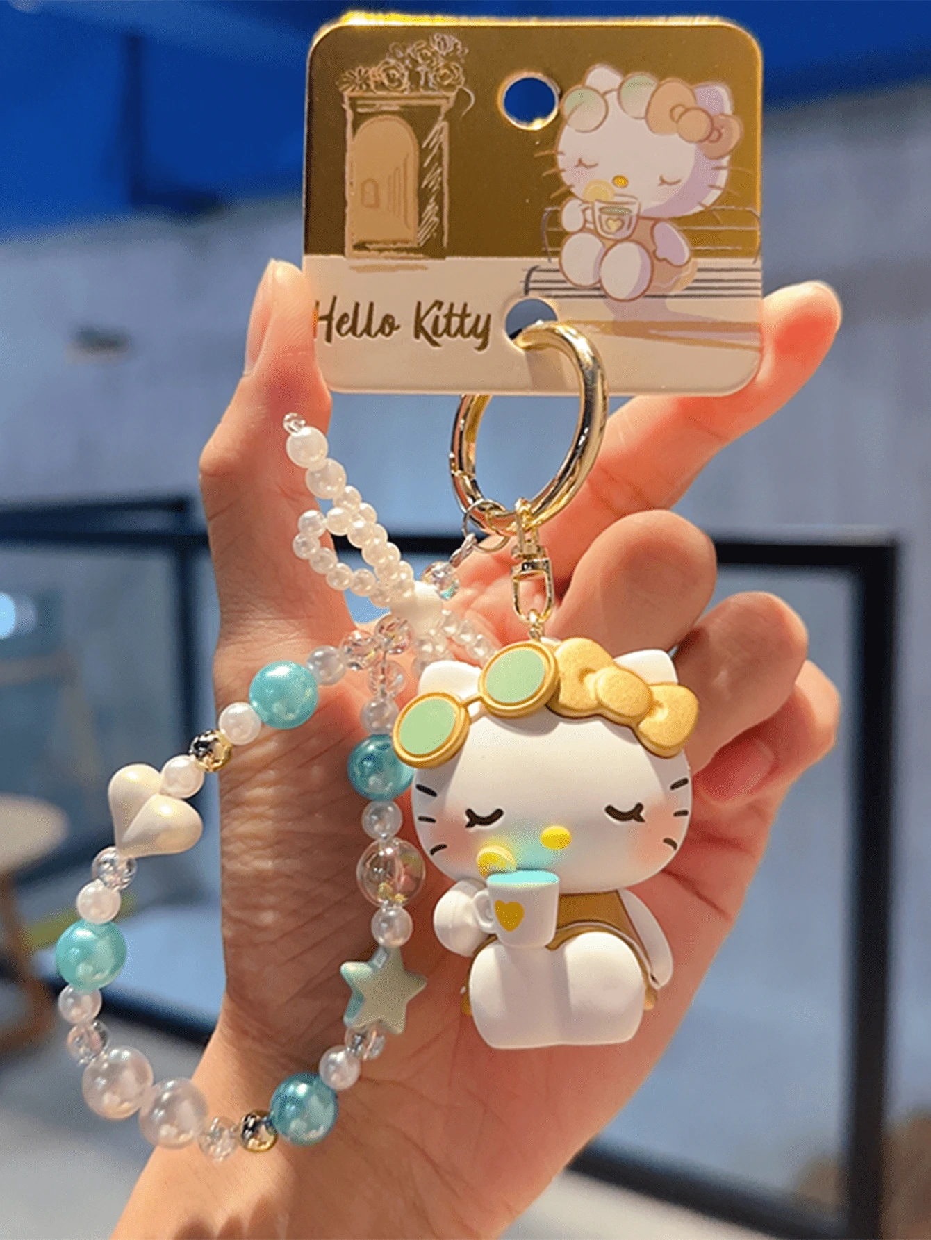 Sanrio Hello Kitty Golden Vacation Series Charm Bracelet Keychain, Stylish & Elegant Design with Pearl Beads & Star Charms, Perfect for Adding a Touch of Luxury to Your Daily Bag or Keys, Ideal Gift for Girls, Teens, and Women Women Love Kawaii Trinkets & Vibesions,