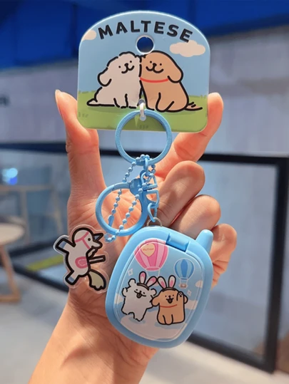 Line Dog Retro Game Keychain - Happy Holiday Edition - Blue Edition, Cute Kawaii Keychain With Mirror & Sound, Fun Decoration For Girls & Teens, Stylish Accessory For Bags & Keys, Perfect For School & Work, Popular Novelty Gift Idea, Unique Retro Phone Design, Adorable Cartoon Pattern, Best For Lovers Of Cute & Quirky Items, Must-Have Collectible Charm For Daily Use & Special Occasions.