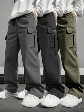 1 Pair Of Men's Casual Sports Cargo Pants, With A Loose Straight Fit And A Drapey Feel, Suitable For Home And Outdoor Activities, And Can Be Used As A Couple's Gift. Made Of 100% Polyester Fiber, It Is Equipped With A Drawstring Waistband For Easy Adjustment, And There Are Multiple Colors Available.