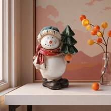 Set di decorazioni natalizie in resina a forma di pupazzo di neve. Questa statuina del pupazzo di neve natalizio aggiunge un fascino festivo alla tua tavola, al camino o al soggiorno di Natale. Perfetto per chi ama le decorazioni natalizie.