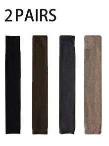 2双男士加厚深色过膝腿套，适合秋冬季节，可运动或休闲穿着，舒适保暖。
