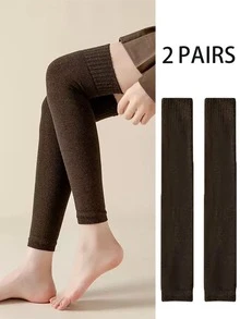 2双男士加厚深色过膝腿套，适合秋冬季节，可运动或休闲穿着，舒适保暖。