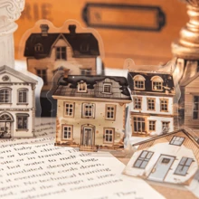 46 hojas/caja Pegatinas de acuarela de la serie de casas pequeñas con estilo de arte retro que se pueden combinar libremente. Material de PET para botellas de agua, equipaje, diarios, portátiles y decoración diaria. También se pueden usar como regalos para fiestas.