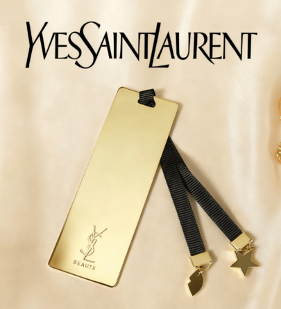 Yves Saint Laurent Metalowe zakładki do książek ze złotą teksturą i gwiazdkowymi zawieszkami w kształcie serca to modne, niezbędne akcesoria do czytania
