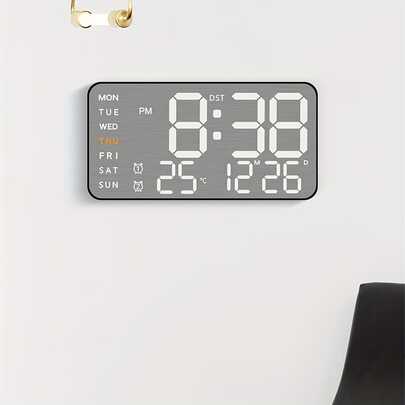 ساعة منبه ذات طراز حديث وبسيط تتميز بشاشة متعددة الوظائف لعرض درجة الحرارة والرطوبة، وساعة إلكترونية، وإنذار إلكتروني LED، ووظيفة ضبط السطوع. تتبنى تصميم قابل للتثبيت على الحائط مع معالجة سطح معدنية مصقولة، مناسبة لغرف المعيشة والنوم وغرف خلع الملابس. وهي خيار هدية رائع.