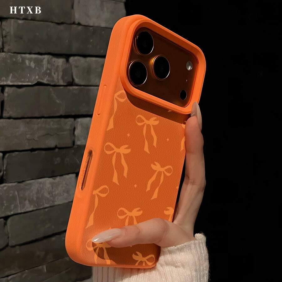 Orange BowThe Stylish And Comfortable Large Perforated Leather Texture Orange Phone Case Is Perfect For A Friend, Significant Other, Or Family Member And Is Compatible With IPhone 17/X/11/12/13/14/15/16 Models, Including Plus, Pro, Max, And SE Versions. - 橘色 - 查看 1