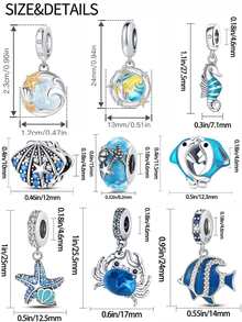 1 pièce en argent sterling 925, avec une étoile de mer coquillage, des perles de verre océaniques, un dauphin embrassant, une étoile de mer et une coquille luisantes, un poisson de mer lumineux, un hippocampe, un crabe, une étoile de corail colorée et une vague océanique, un pendentif avec perle de vague océanique blanche lunaire. Convient pour la création de bijoux sur le thème de l'océan.