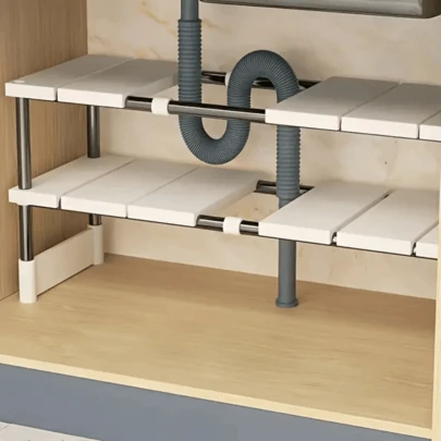Prateleira extensível para armazenamento sob a pia da cozinha, reforçada em aço inoxidável, com várias camadas, ideal para armários de cozinha. Multifuncional, pode ser usada para guardar panelas, frigideiras e outros utensílios.