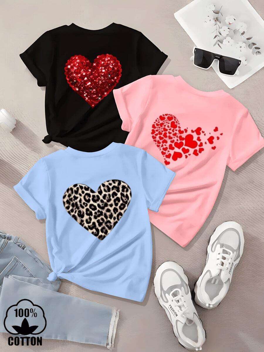 Esta elegante y nueva camiseta de manga corta para niña, 100 % algodón, luce un bonito estampado de corazones. Hecha de tela suave, esta camiseta holgada y versátil es cómoda y agradable al tacto. Ya sea para una reunión familiar, una actividad escolar o para jugar, esta camiseta permite que tu hija se mueva con libertad y comodidad. - Rosa - Ver 1