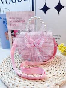 Mini bolsa feminina de tecido com pérolas, fecho magnético na aba, detalhe de laço, acabamento em tela, alça de ombro ajustável (pode ser usada no ombro, transversal ou como porta-moedas). Ideal para presente de aniversário, volta às aulas, feriados e atividades ao ar livre.