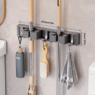 Soporte de metal resistente para escoba y trapeador con gancho ajustable - Organizador montado en la pared para el hogar, la cocina, el jardín, la lavandería, el garaje - Solución de almacenamiento duradera para herramientas y equipos