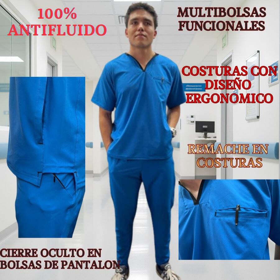 Uniforme quirúrgico para caballero 100% antifluido, ideal para profesionales de la salud que buscan comodidad y durabilidad. Confeccionado con tela de alta resistencia, cuenta con camisa de corte ergonómico y costuras reforzadas con sobrecostura  en las bolsas. El pantalón tipo jogger ofrece ajuste moderno, pretina elástica y múltiples bolsillos y cierre en bolsas funcionales para mayor practicidad. Fácil de mantener y de secado rápido. - Azul Medico - Ver 1