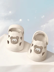 Letnie, nowe sandały dla maluchów w stylu kreskówkowym z 2025 roku, antypoślizgowe, wytrzymałe kapcie domowe, oddychające buty dla niemowląt, materiał EVA z zamkniętymi palcami, lekkie i wygodne buty ogrodowe dla niemowląt - Beżowy - Zobacz 8