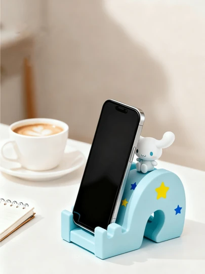 Sanrio Officially Licensed Cinnamoroll Slide-Shape Phone Stand – White Cinnamoroll With Rosy Cheeks & Long Ears, Light Blue Slide Decorated With Blue Stars & Yellow Moon, Anti-Slip Silicone Base, Universal Cradle Compatible With IPhone/Android/Tablet, 7.4x10x4.5cm Compact Size, Cute Kawaii Room Decor & Travel Gift For Girls, Teens & Sanrio Collectors