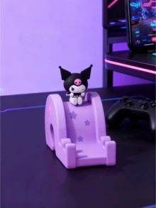 Sanrio Officially Licensed Kuromi Phone Stand – Purple Slide-Shape with Black & White Kuromi (Pink Skull), Star Patterns, Anti-Slip Silicone Base, Universal iPhone/Android/Tablet Cradle, 7.4x10x4.5cm Compact Size, Cute Kawaii.