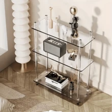 Mesa lateral transparente em acrílico estilo italiano, elegante e compacta, ideal para hall de entrada, banheiro, sala de estar e quarto. Perfeita para exibir plantas, livros, álbuns de fotos, xícaras e estatuetas. Fácil de instalar e limpar.