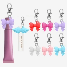 1pc Angel Wings/Bow Keychain Lipstick Keychain Cover, Portable Lip Gloss Storage Box, Lip Balm Keychain, Travel Accessory, Lipstick Keychain Cover, Multifunctional Accessory, Portable Lipstick Keychain Cover Design, Easy To Hang On Keys, Women Accessory - Multicolor - View 3