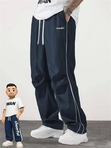 Pantalones de estilo universitario urbano para hombre, otoño  Pantalones holgados y estrechos con cordón y bolsillo de unicolor para hombre, pantalones cargo estrechos para vacaciones largas, regalo para esposo o novio - Azul Marino - Ver 1