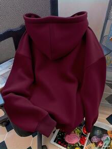 Sudadera con capucha para mujer con el diseño estampado <<NEW YORK», corte holgado e informal, bolsillo canguro y capucha con cordón. - Burdeos - Ver 2