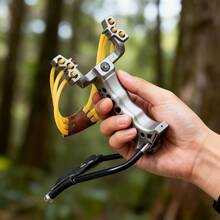 1. Silver Slingshot With An Ergonomic Grip Design, Ideal For Outdoor Adventures And Practice. Features A Wrist Rest, High-Speed Folding Mechanism, Built-In Compass, And Heavy-Duty Rubber Bands For Powerful Elasticity. Practical And Convenient. - 1pcs - View 11