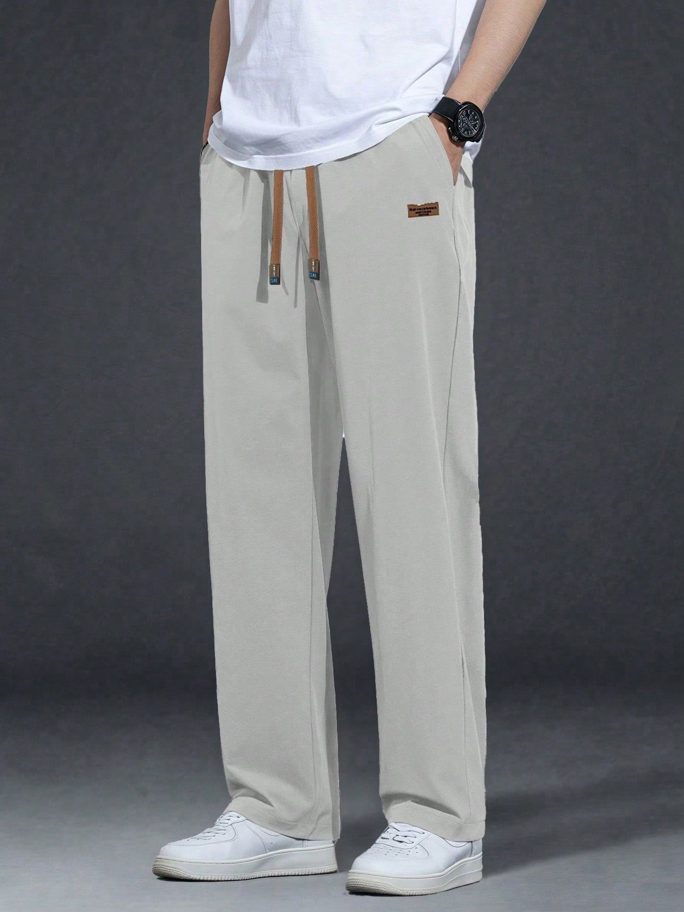 Men's Draping Waist Drawstring Oblique Pocket Solid Color Casual Pants - Grey - View 1