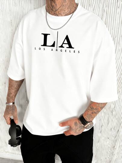 Letras estilizadas de LA Los Angeles evocan la sofisticación urbana y el atractivo de la ciudad de las estrellas un símbolo de aspiraciones logros y un estilo de vida vibrante 100% algodón camiseta de hombre caballero moderna confort casual verano moda urbana España