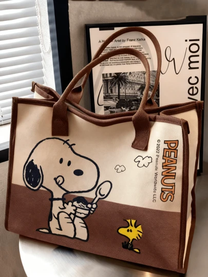Bolsa de lona de Snoopy de Peanuts, tela blanca y caramelo con estampado de Snoopy con cuchara y Woodstock, interior espacioso, tamaño 30x39x9 cm, asas trenzadas de 21 cm de grosor, material de lona resistente, perfecta para el día a día, el trabajo y el ocio, regalo ideal para novias y fans de Peanuts.