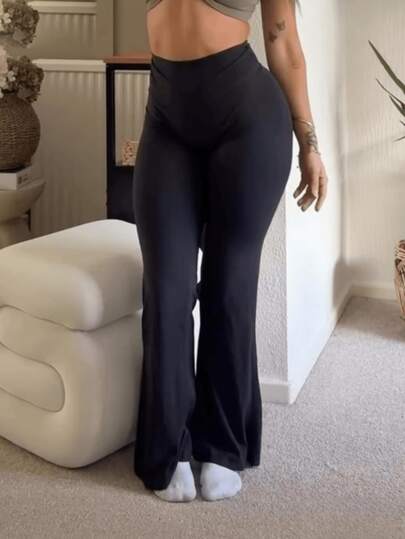 Pantalones acampanados elásticos de cintura alta de unicolor de ajuste regular para mujer, ideales para el club