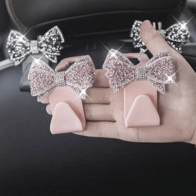 AD 2 pièces Crochets de support de repose-tête de voiture, organisateur de strass étincelant pour sac à main, sac, rangement de portefeuille, crochets de support de dossier de décoration de papillon, convient à la plupart des modèles de véhicules