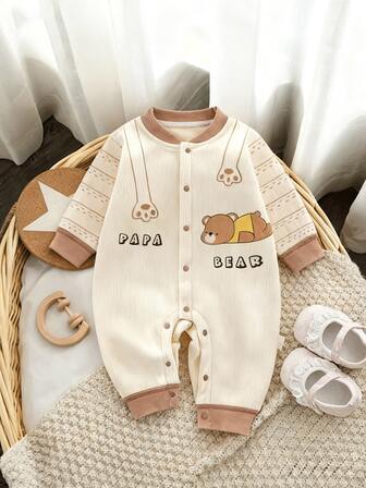 新生儿奶白色绒面连体衣，保暖舒适，适合秋冬季穿着