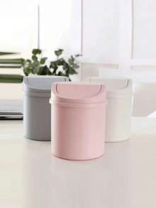 1 Stück Schreibtisch Kunststoff Wippen-Deckel Mülleimer, Haushalt Mini Mülleimer, Kreativer Europäischer Stil, Papierkorb mit Deckel auf dem Wohnzimmertisch. Ein kleiner, mini Kunststoff Mülleimer mit Schwenkdeckel, geeignet für die Verwendung auf Haushalt Tischen. Dieser Mülleimer mit Deckel benötigt keinen Strom und ist perfekt für Wohnzimmer, Teebereich, Büro, Nachttisch, Badezimmer, Schlafzimmer und allgemein für Zuhause.