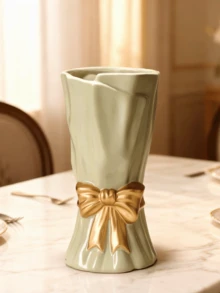 这款饰有蝴蝶结的白色树脂花瓶是家居装饰的绝佳之选。它是一款大型波西米亚风格花瓶，非常适合摆放在架子、桌子或客厅中。无论是在客厅、婚礼还是家庭办公室，它都是室内装饰和节日庆典的理想之选，也是一份优雅的礼物。 - 彩色 - 查看 4