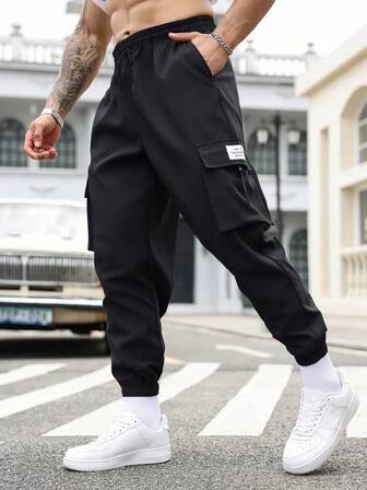 1 pieza Pantalones de carga casuales para hombre con cordón en la cintura y bolsillos múltiples para exteriores