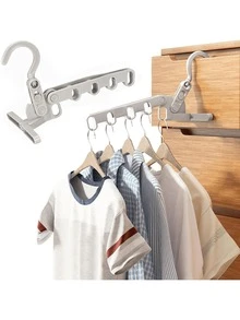 五孔可折叠晾衣架 - 采用轻便耐用的塑料制成，节省空间，便于携带，安装简便，适合旅行者、宿舍住户、家庭主妇、学生，可用于旅行、宿舍生活、居家使用、酒店住宿等场合。 - 彩色 - 查看 1