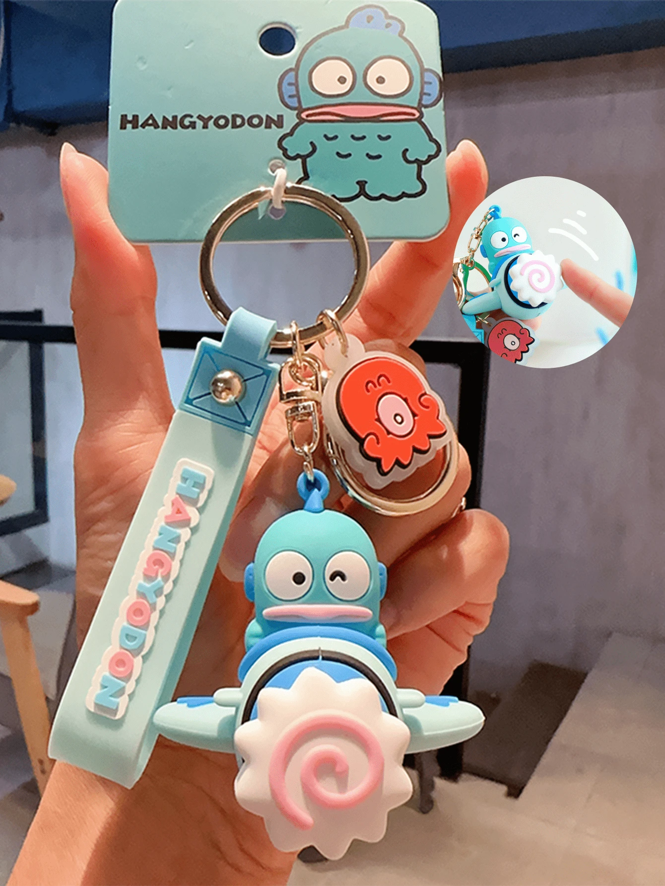 Sanrio Hangyodon Rotating Plane Keychain, Licensed 3D Cartoon Design, Adorable Rotatable Plane Shape with Hangyodon Elements, High-Quality Material, Durable Keyring, Bag/Car Keys Ornament, Kawaii Cartoon Accessory, Ideal for for Youth/Sanifto Giasd Great for Daily Matching & Gifting