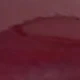 عنابي اللون