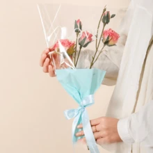 100个情人节花束包装袋，带英文字母图案的花卉礼品袋，表达爱意的包装袋，花店节日派对鲜花包装袋，加厚防水包装袋，节日礼品包装袋，适用于情人节花束包装、鲜花礼品包装、各种鲜花包装、婚礼、生日、派对包装。 - 彩色 - 查看 3