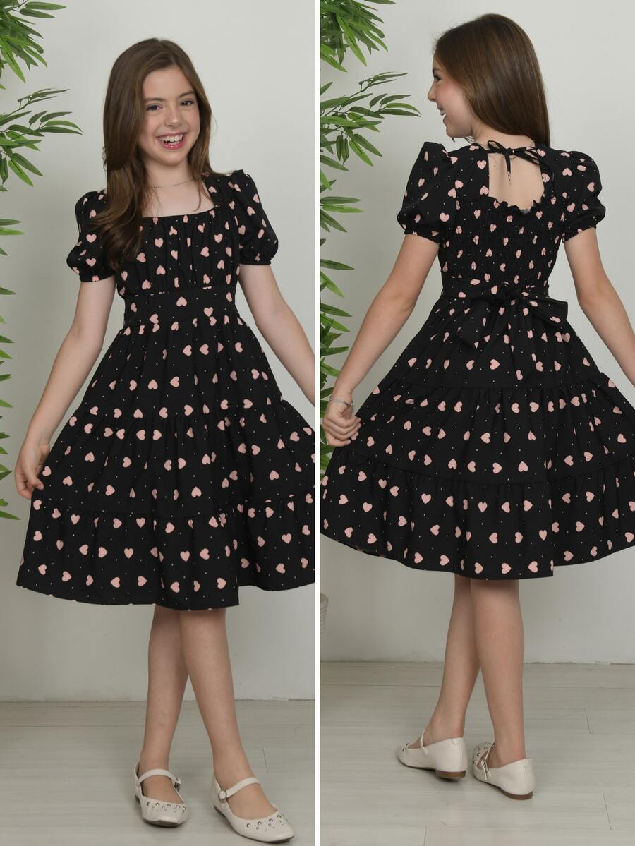 Girls' Dress With Heart Print For Pre-Teen And Teenage Girls, Navy Blue, Pink, Black, Red, Sizes 10, 12, 14, 16. Short Sleeves With Bow At The Back, Flared Midi Style, Comfortable, Lightweight, Soft Fabric, Elegant, , Perfect For Birthdays, Parties, Graduations, Events, Christmas, Children's Day, Casual Outings, Modern Gift, With Layered Skirt, Charming Design, Gathered Detail At The Bust And Back, Perfect Fit, Kids' Fashion, Delicate Look, Decorative Bow At The Back, White Heart Print, Loose-Fitting Dress, Comfortable, Great Fit And Beautiful Drape, Ideal For Photos And Special Moments, Fashion For Children And Teenagers,  And Stylish Model, Ideal For Gifting To Someone You Love, Dress For Various Occasions, Printed With Hearts, Puff Sleeves, Straight Neckline, Tie Closure, Versatile Dress, Comfortable, Excellent Quality, Ready For Delivery. - màu đen - Xem 1