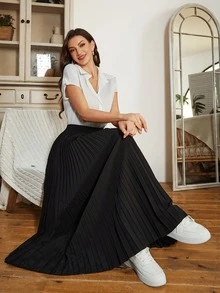 女士优雅简约百搭纯色百褶裙，涤纶材质，适合度假、办公、日常穿着、约会、舞台表演和音乐会等各种场合，四季皆宜。 - 黑色 - 查看 3