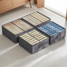 灰色可折叠衣物分隔收纳盒，带提手，节省空间，是衣柜收纳的理想之选。这款双层衣物裤装收纳箱适用于存放内衣、袜子、长裤、T恤、短裤和瑜伽裤。是理想的家居收纳方案。 - 灰色 - 查看 3