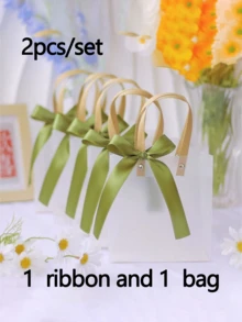 三色透明礼品袋，带蝴蝶结丝带，尺寸为 5.91*5.12*2.76 英寸，适用于生日、伴娘礼物、糖果、珠宝、婚礼、情人节、购物等场合。 - 多色 - 查看 11