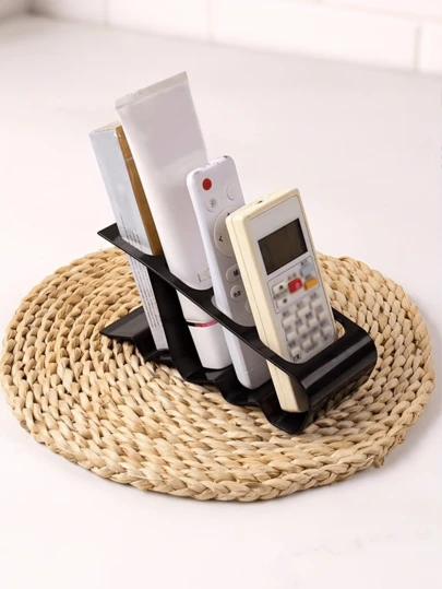 Organizador de control remoto de 4 ranuras, soporte universal para control remoto, material de plástico duradero, organizador de escritorio negro con estilo, diseño ergonómico, sostiene 4 controles remotos, ahorro de espacio, adecuado para el hogar, la oficina, el soporte de TV, caja para controles remotos, diseño minimalista, almacenamiento práctico, multicompartimento, ideal para trabajo remoto