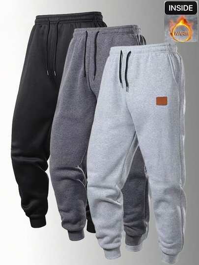 1件装男士简约时尚长裤，适合日常休闲穿着和运动。这款抽绳腰带宽松长裤采用针织面料，裤脚收口，亲肤柔软，弹性十足。是送给男友、丈夫或家人的完美礼物。这款长裤完美诠释了简约与时尚的美学理念。男士抽绳腰带简约时尚长裤