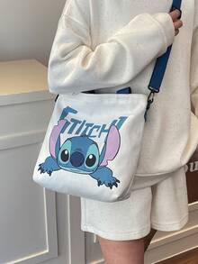 史迪奇帆布手提袋，厚帆布材质，可爱史迪奇躺卧图案+蓝色“史迪奇”字样，容量大、轻便舒适，可装书籍/笔记本电脑，适合青少年/女孩/女性/动漫爱好者，可用于学校/工作/购物/旅行/休闲外出，必备单品，美观的生日/节日/特殊场合礼物。