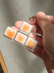 1pc Caramel Bread Shaped Keychain, Stress Relief Fidget Toy, Mechanical Keyboard Switch Tester, Keyring, Desktop Decor, Phone Charm, Creative Novelty Anti-Anxiety Finger Toy