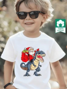 Esta nueva camiseta de manga corta para niño está hecha 100 % de algodón y luce un elegante estampado navideño de dinosaurios. Es informal y versátil. Su tejido suave y agradable al tacto protege la delicada piel de los niños, permitiéndoles moverse con libertad y sentirse cómodos durante las reuniones familiares, las actividades escolares o los juegos al aire libre. - Blanco - Ver 1