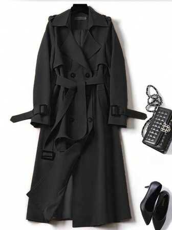Manteau trench long noir pour femmes, col croisé double boutonnage, design taille ceinturée, élégant pour le travail et les sorties, hiver