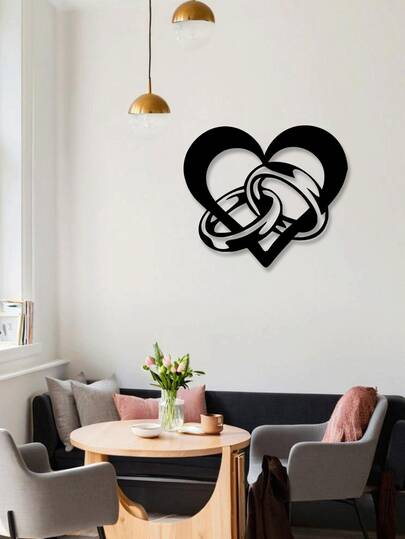 This Luxurious Wedding-Style Metal Decorative Piece Features A Hollow Heart Design, With A Pair Of Wedding Rings Embedded Within The Heart. It Has A Refined Texture And Exudes A Romantic Ceremonial Atmosphere. This Metal Decorative Item, With The Theme Of Wedding Rings And Heart Shape, Is Very Suitable For Use In The Wedding Room, Wedding Venue, Anniversary Gifts, And Couples' Bedrooms.