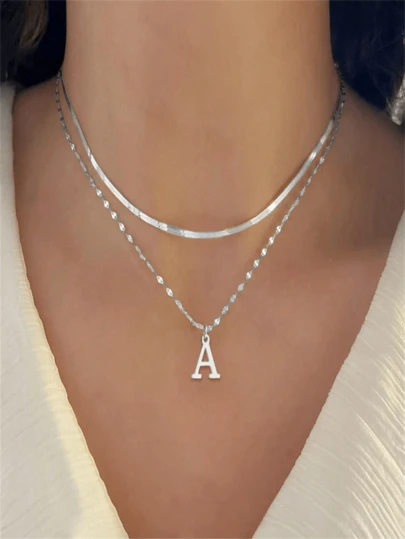 Set de 2 collares minimalistas de acero inoxidable con cadena en espiga y labios para mujeres